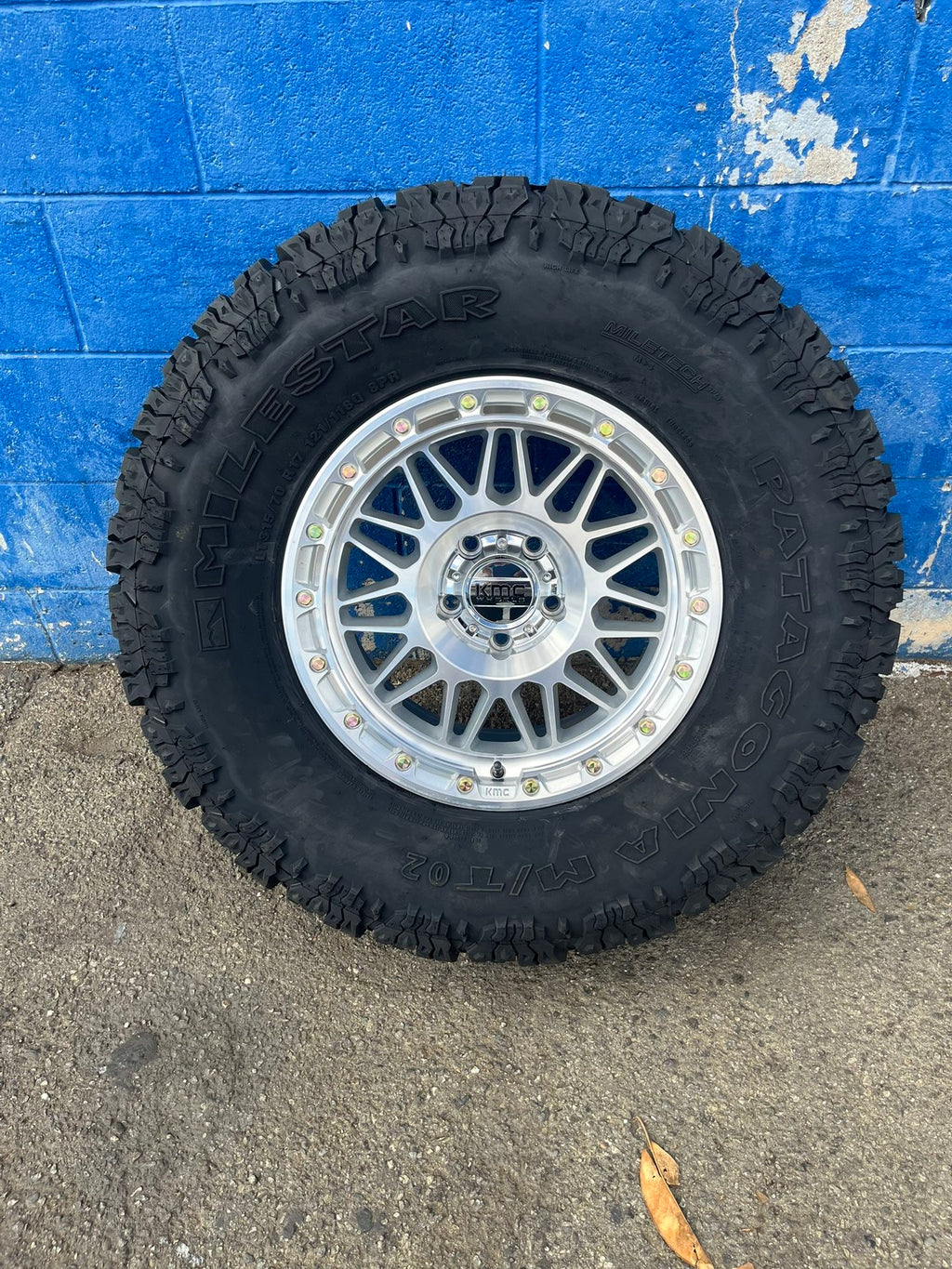 KMC KM555 Attack Wheels 17”5x5/Milestar Patagonia M/TO2 315-70-17 Machined